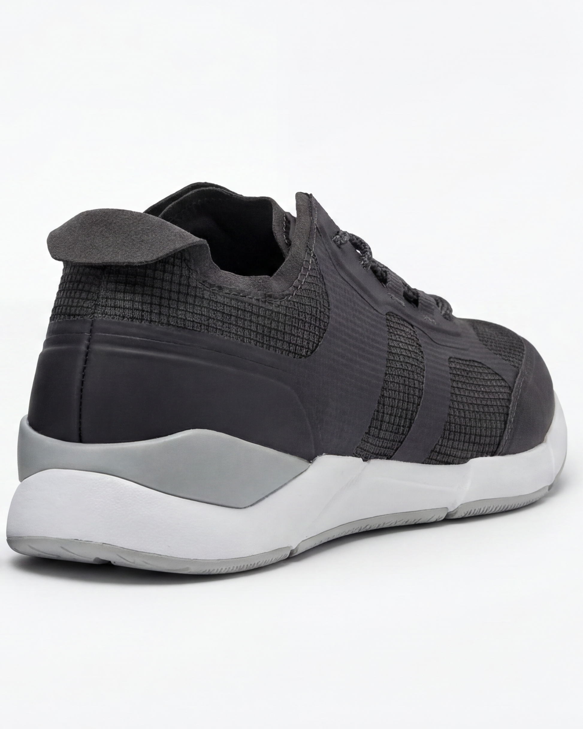 The SLAM CREW SHOES, technical footwear in dark gray with a textured mesh upper, black laces, padded heel, and thick white and light gray sole, are displayed from a rear side angle on a white background.
