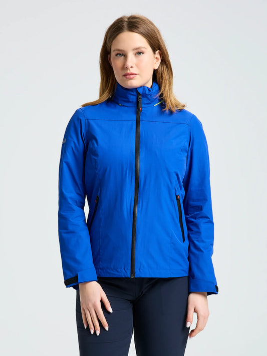 A person with long brown hair is wearing the SLAM CREW WS WARM HOODED JKT in bright blue and black pants, standing against a plain light gray background.
