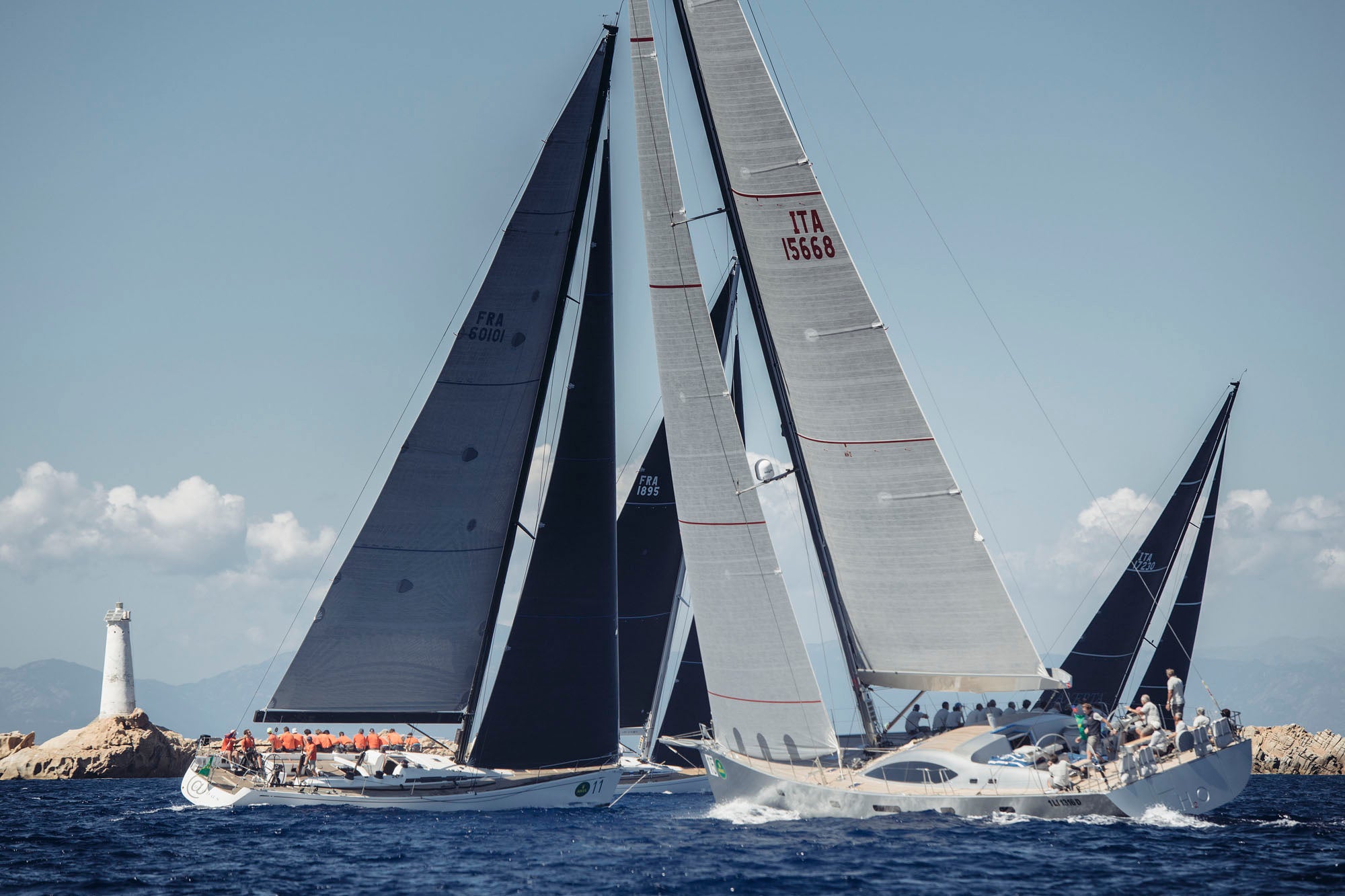 Photo showing the Maxi Rolex Cup, with boats in the foreground competing to win the regatta