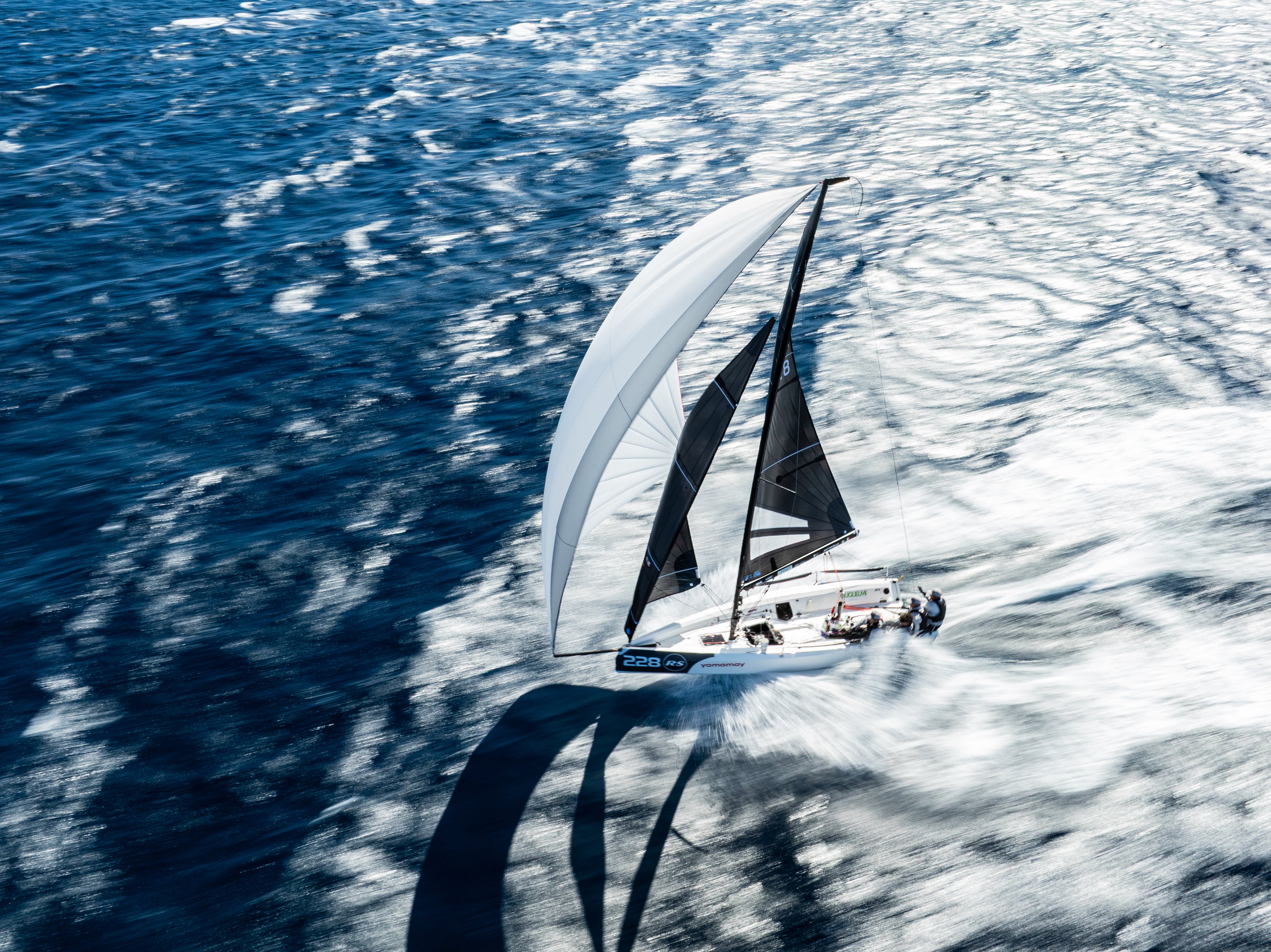 RS21 boat sailing over the sea during a sunny morning