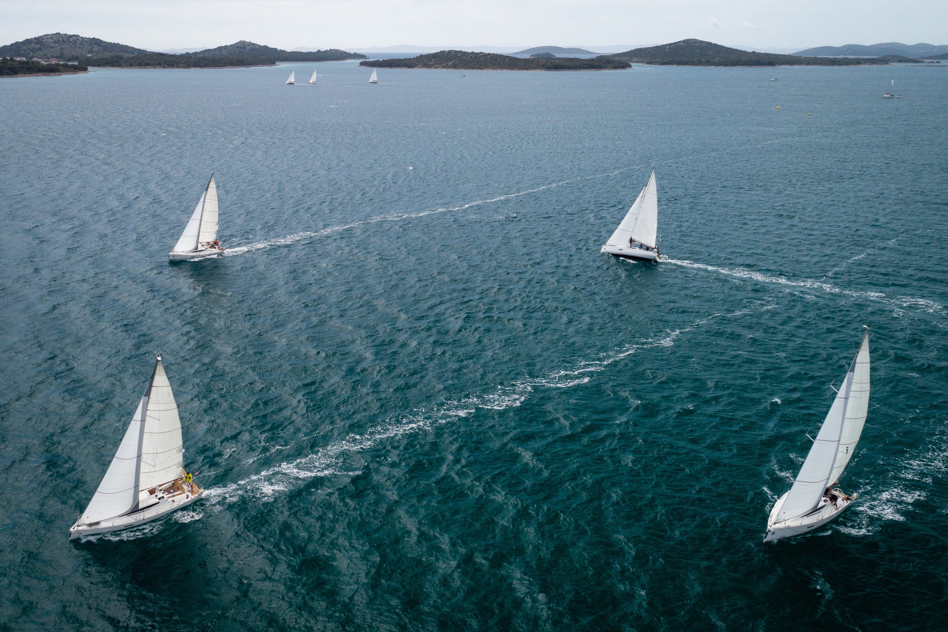 Athletes training on boats during the summer