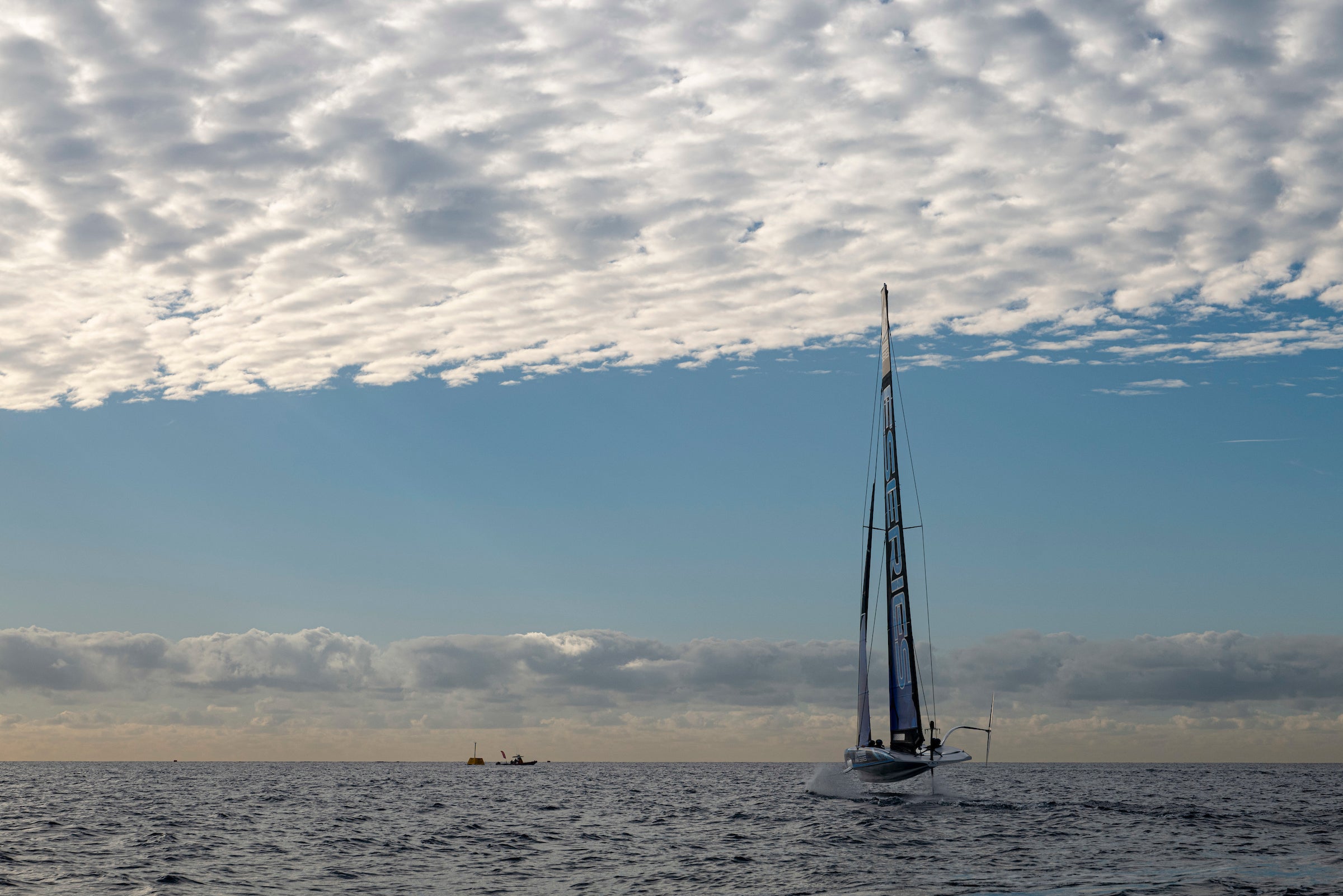 Boat sailing in a very cloudy day